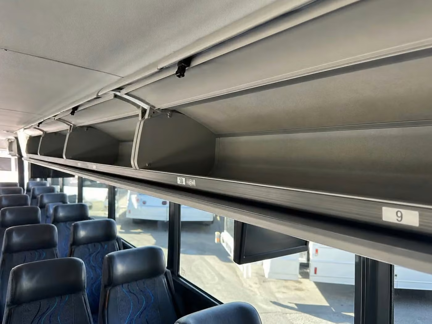 rockledge 25 passenger minibus overhead storage